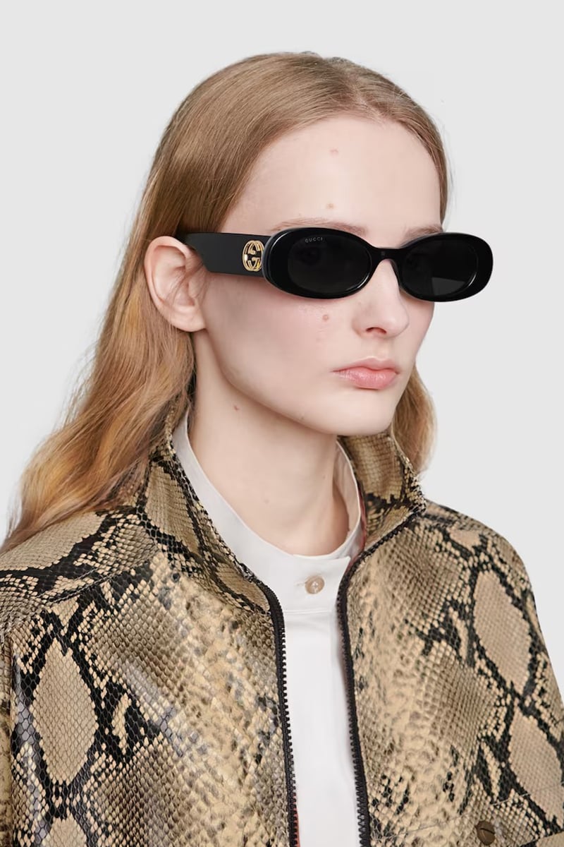 Gucci black oval sunglasses hot sale