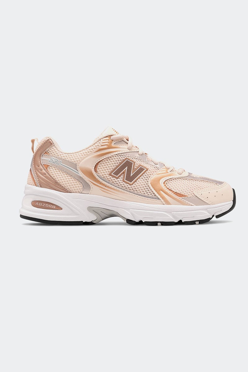 Rose gold new balance trainers on sale