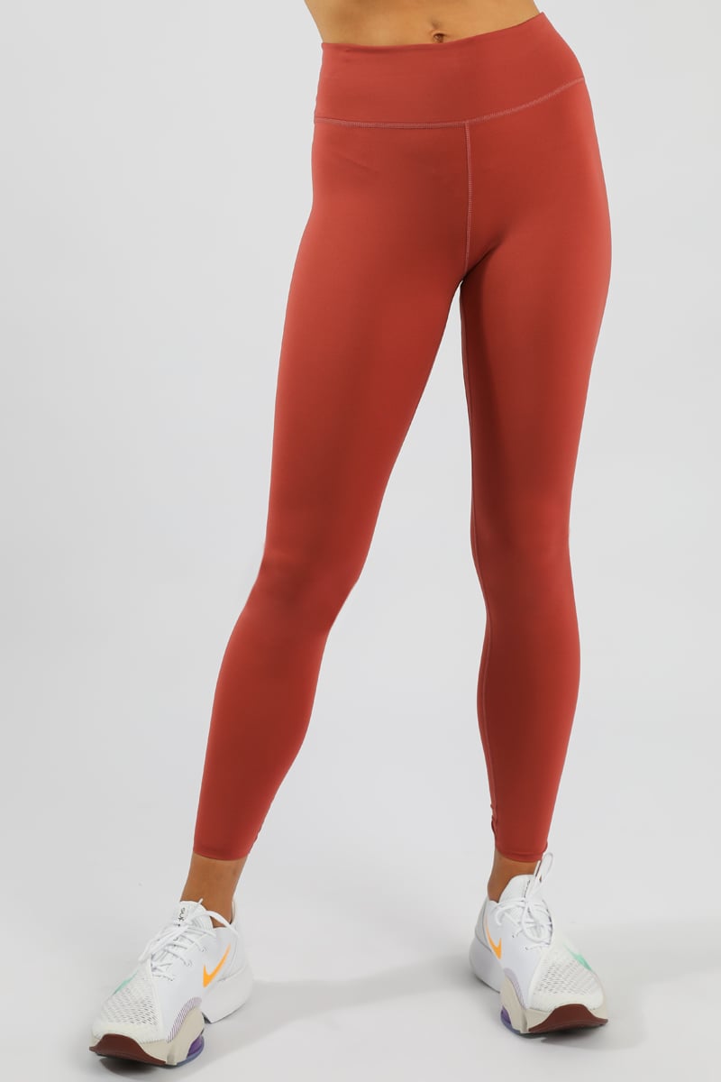 Nike Therma-FIT One Women's Mid-Rise Leggings with Pockets (as1, Alpha, s,  Regular, Regular, Canyon Rust/Orange Trance/Orange Trance) at   Women's Clothing store