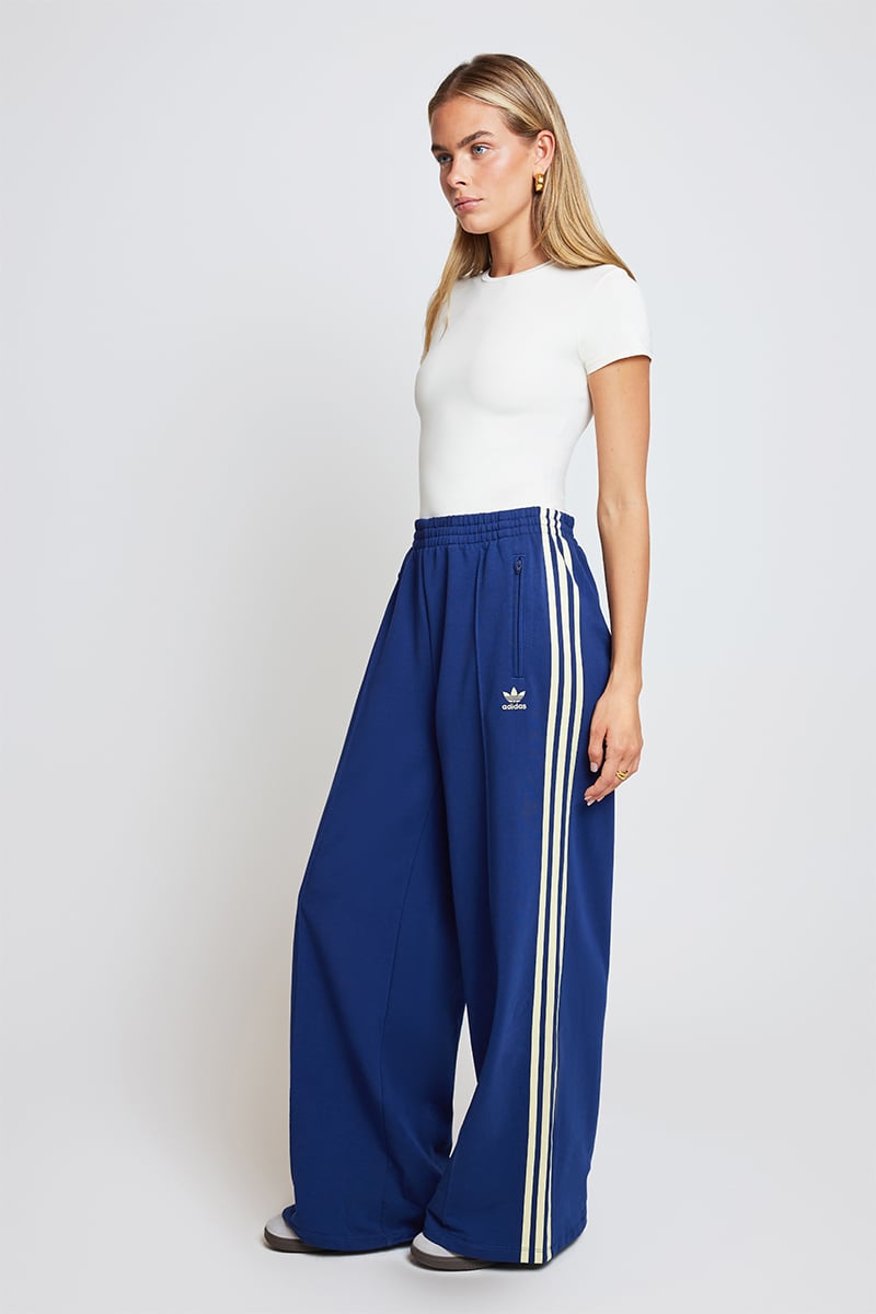 Navy blue adidas track pants womens sale