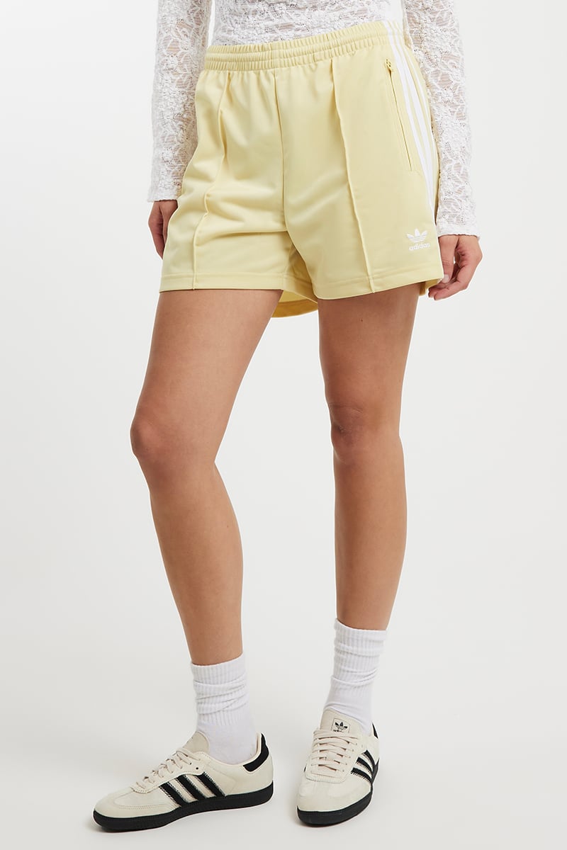 adidas Originals Firebird Short Light Orchid | Stylerunner adidas Originals Firebird Short Light Orchid | Stylerunner