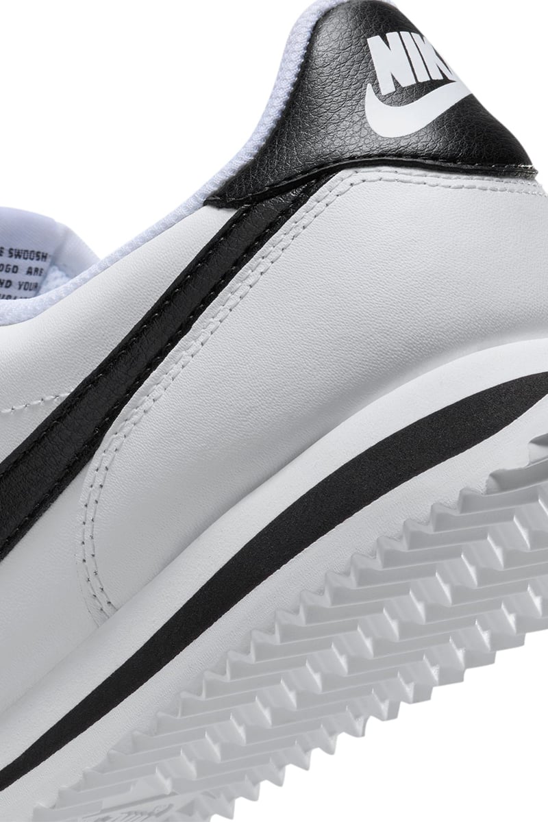 Nike cortez white with black swoosh shop