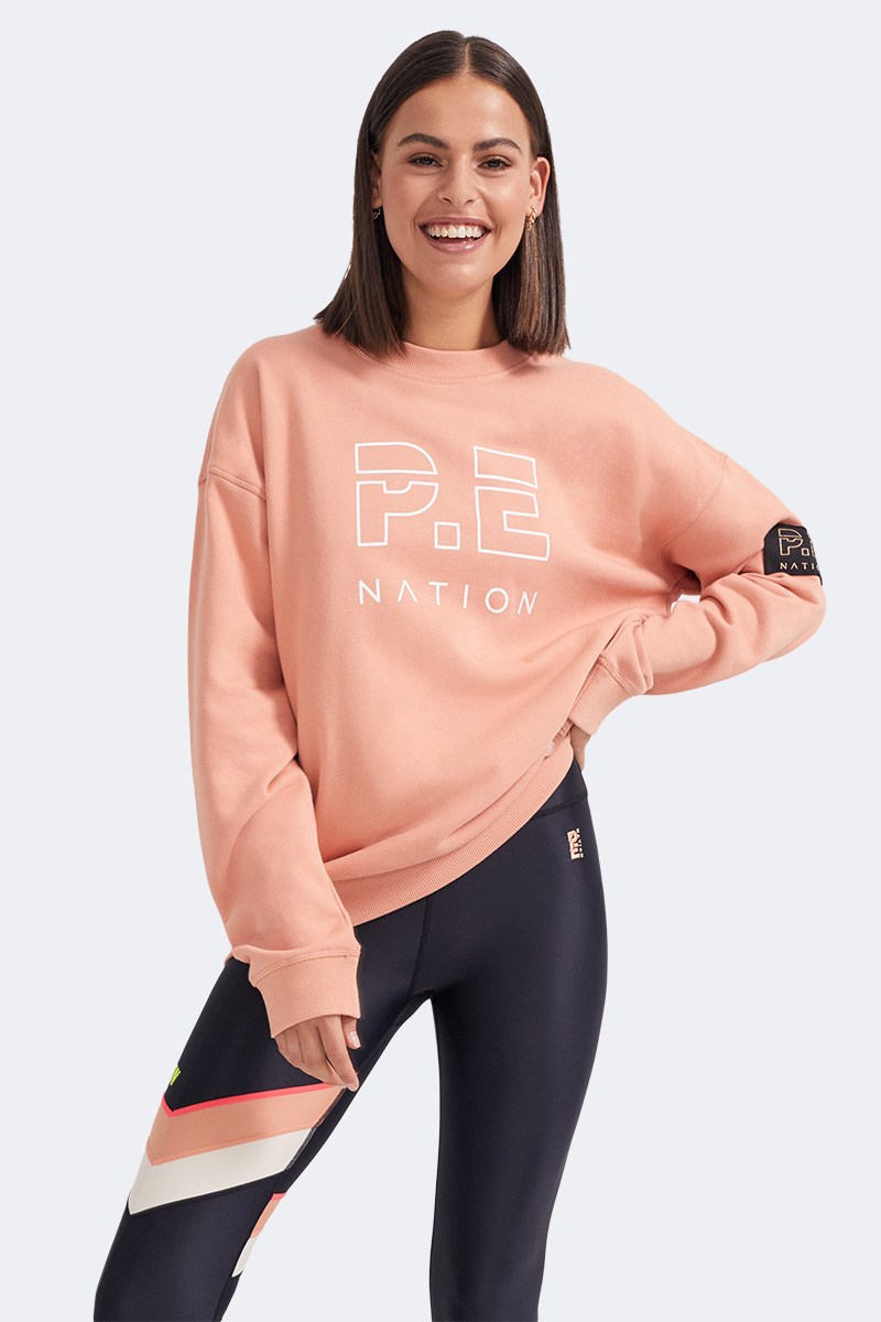 peach sweat shirt