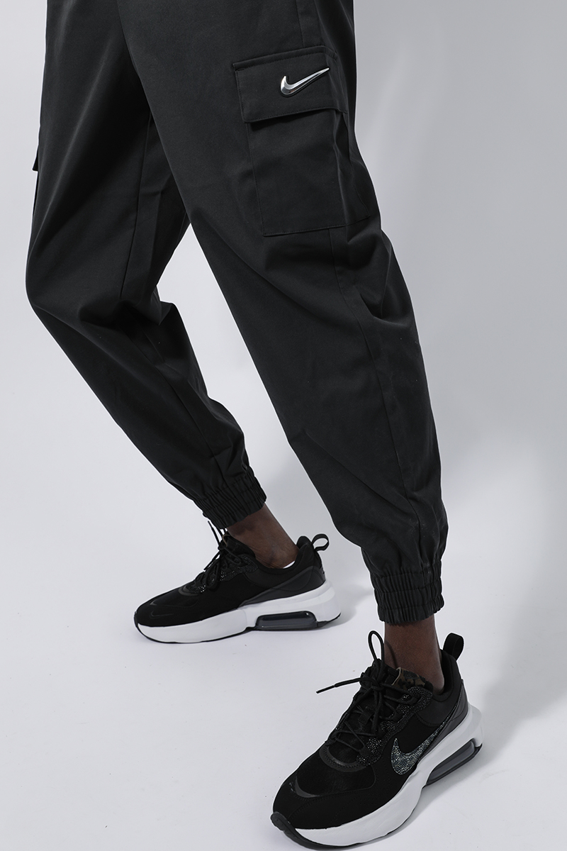 Nike Sportswear Swoosh Utility Jumpsuit - Black | Stylerunner